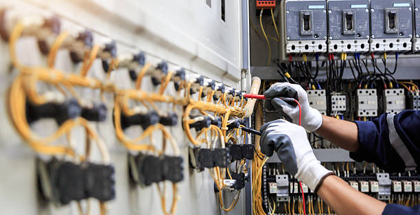 Professional Electrical Panel Upgrade technician working in Borden, IN